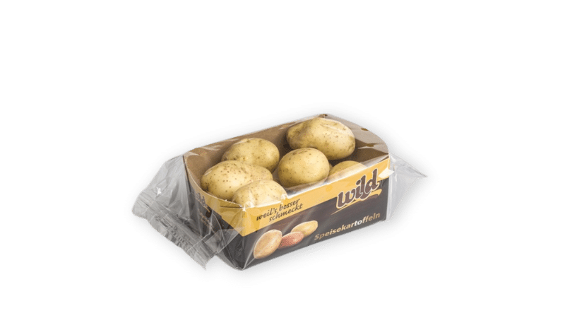 paper punnet wrapped with foil with potatoes